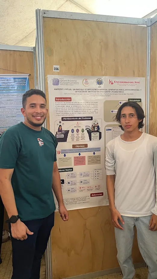 Dos personas junto al póster de un proyecto
